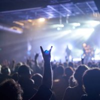 rock band performer cheering up the crowd at music festival - concert stock pictures, royalty-free photos & images