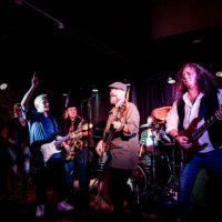 rock band performing on stage - concert stock pictures, royalty-free photos & images