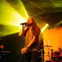 rock band performing on stage at night club - concert stock pictures, royalty-free photos & images
