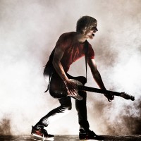 rock star with his guitar. - concert stock pictures, royalty-free photos & images