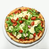 rocket pizza, parmesan, cherry tomatoes - junk food stock pictures, royalty-free photos & images