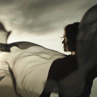 romantic girl in long dress enjoying the wind. standing on a cliff - fashion stock pictures, royalty-free photos & images