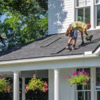 roofing contractors replacing damaged roofs after a hail storm - home decoration stock pictures, royalty-free photos & images