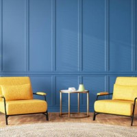 room with empty blue wall panelling with two armchairs - home decoration stock pictures, royalty-free photos & images