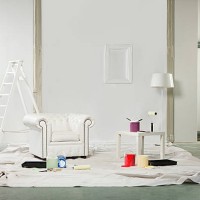 room with paint pots and white armchair - home decoration stock pictures, royalty-free photos & images