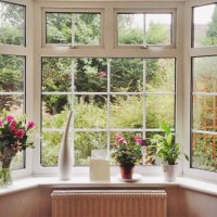 rose bouquet and pot plants on bay window in a home - garden decoration stock pictures, royalty-free photos & images