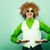 saint patrick's day man celebrating with shamrock vest - fashion stock pictures, royalty-free photos & images