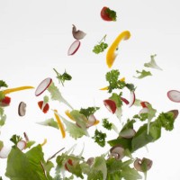 salad against a white background - food stockfoto's en -beelden