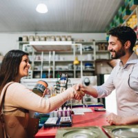 salesman and customer greeting at building material store - home decoration stock pictures, royalty-free photos & images