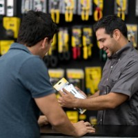 salesman working at the hardware store and talking to a customer - home decoration stock pictures, royalty-free photos & images