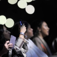 Saudi women take a selfie as they attend a concert by Egyptian pop sensation Tamer Hosny in the western city of Jeddah on March 30, 2018. - Thousands...