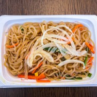 savory japchae stir-fried noodles side dish - junk food stock pictures, royalty-free photos & images