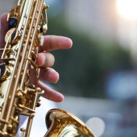 saxophone,international jazz day and world jazz festival. saxophone, music instrument played by saxophonist player musician in fest. - concert stock pictures, royalty-free photos & images