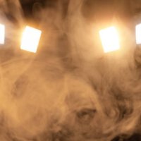 scene, stage lighting with gold colored spotlights and smoke - concert stock pictures, royalty-free photos & images