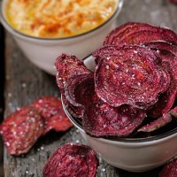 sea salted beet chips with a hummus dip - junk food stock pictures, royalty-free photos & images