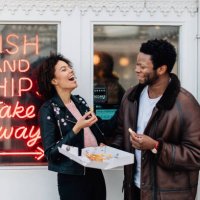 seaside couples - junk food stock pictures, royalty-free photos & images