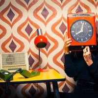 secretary in vintage office holding a clock - home decoration stock pictures, royalty-free photos & images