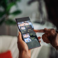 selecting fast food options on a tablet - junk food stock pictures, royalty-free photos & images