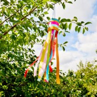 self-made wind chime hanging in a tree, decoration for garden party in summe - garden decoration stock pictures, royalty-free photos & images