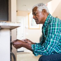 senior black man home repairs - home decoration stock pictures, royalty-free photos & images