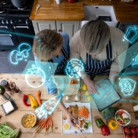 senior couple cooking at home and using technology to do a calorie count - food stock pictures, royalty-free photos & images