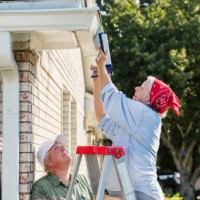 senior couple doing home maintenance - home decoration stock pictures, royalty-free photos & images
