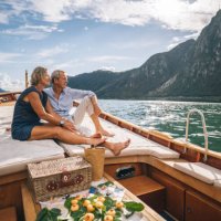 senior couple enjoy time together on boat, lake lugano - travel stock pictures, royalty-free photos & images