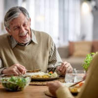 senior couple enjoying dinner together - food stock pictures, royalty-free photos & images