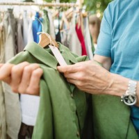 senior man shopping at a local or flea market. sustainable lifestyle and zero waste concept. - fashion stock pictures, royalty-free photos & images
