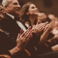 senior people clapping in the theater, focus on hands - concert stock pictures, royalty-free photos & images