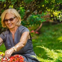 senior woman gardening on beautiful spring day - garden decoration stock pictures, royalty-free photos & images