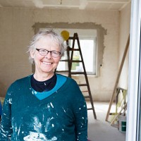 senior woman painting her new house happiness - home decoration stock pictures, royalty-free photos & images