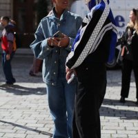 September 13: Honey Sweet Elias is seen wearing a Miu Miu Denim Ensemble and Laura Ingham is seen wearing Navy Track Top. At S.S. Daley during London...