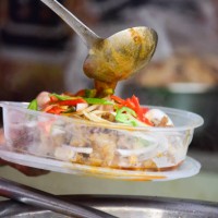 serving boiled ox head and hoof meat with seasoning - junk food stock pictures, royalty-free photos & images