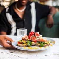 serving fresh gourmet bruschetta - food stock pictures, royalty-free photos & images