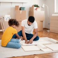 settling into their new home - home decoration stock pictures, royalty-free photos & images