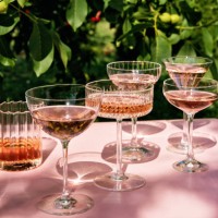 several cocktail or mocktail glasses with rose wine drink - home decoration stock pictures, royalty-free photos & images