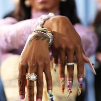 Sha'Carri Richardson, nail and jewelry detail, attends the 2025 Met Gala Celebrating 