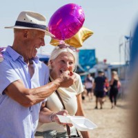 sharing lunch at the funfair - junk food stock pictures, royalty-free photos & images