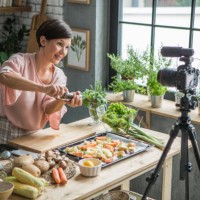 she is enjoying at cooking and vlogging - food stock pictures, royalty-free photos & images