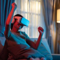 she watched the concert in virtual reality through vr glasses in the living room of her home. - concert stock pictures, royalty-free photos & images