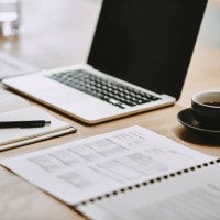 shot of a notebook and laptop in an office - home decoration stock pictures, royalty-free photos & images