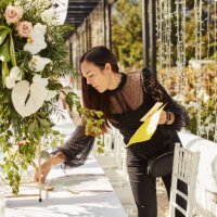 shot of a young woman decorating a table with place card holders in preparation for a wedding reception - garden decoration stock pictures, royalty-free photos & images