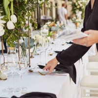shot of an unrecognisable woman decorating a table in preparation for a wedding reception - home decoration stockfoto's en -beelden