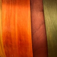 side of a basket made of thin cut of wood material and colored in orange green and brown tones - home decoration stock pictures, royalty-free photos & images