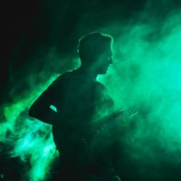 silhouette of a guitarist on stage light and smoke effects. - concert stock pictures, royalty-free photos & images