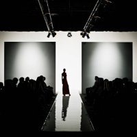 silhouette of female model on catwalk - fashion week stock pictures, royalty-free photos & images