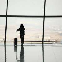 silhouette of travelers in airport - travel photos et images de collection