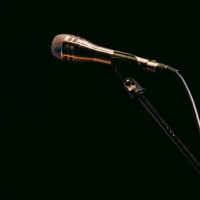 silver microphone stand with microphone on black background - concert stock pictures, royalty-free photos & images