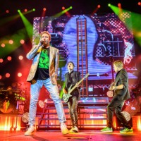Simon Le Bon, John Taylor and Dominic Brown of Duran Duran perform on stage during the Future Past tour at Utilita Arena Birmingham on May 5, 2023 in...